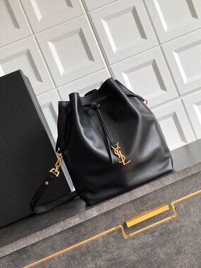 Saint Laurent Drawstring Leather Bucket Bag with Cassandre Logo
